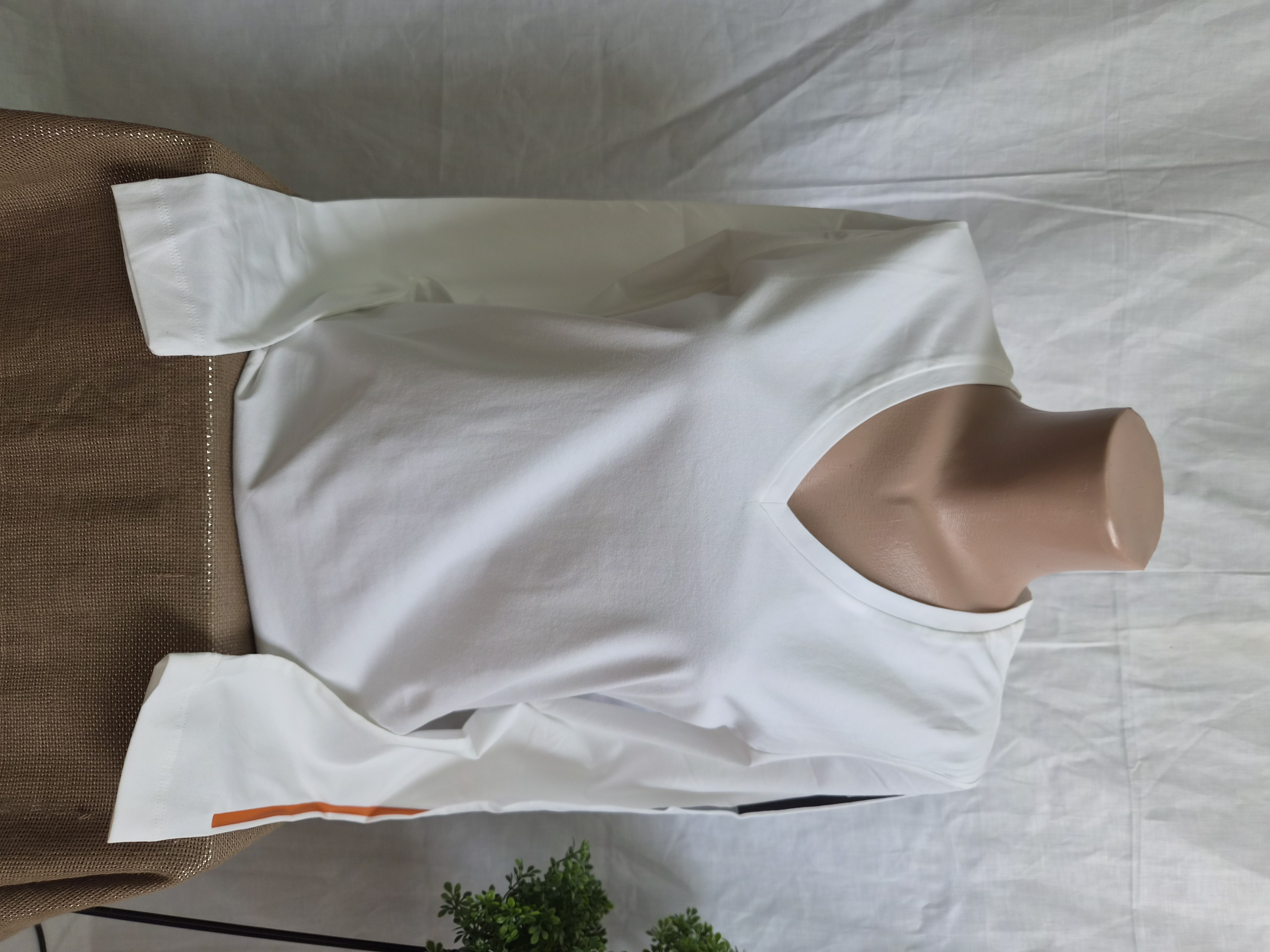 Women's white blouse with V-neck and long sleeve